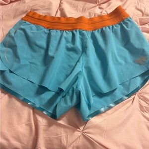 Run in rabbit Women’s Light Blue Athletic Running Shorts with Orange Waistband